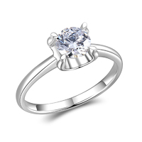 Four-Prong Solitaire Engagement Ring in 18K White Gold | Features a Comfort Fit Design