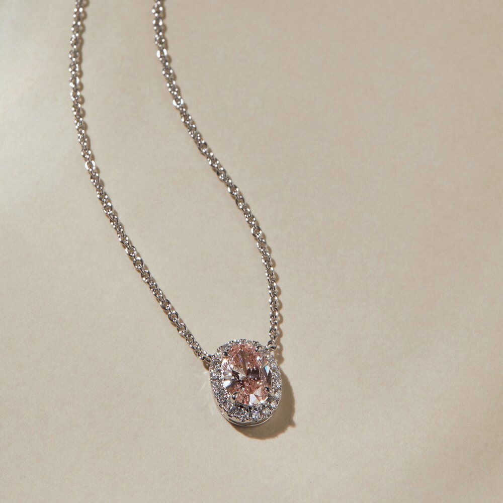 Dreamy 0.79 ct. tw. Oval-Cut Fancy Pink Lab-Grown Diamond Pendant with Petal Halo