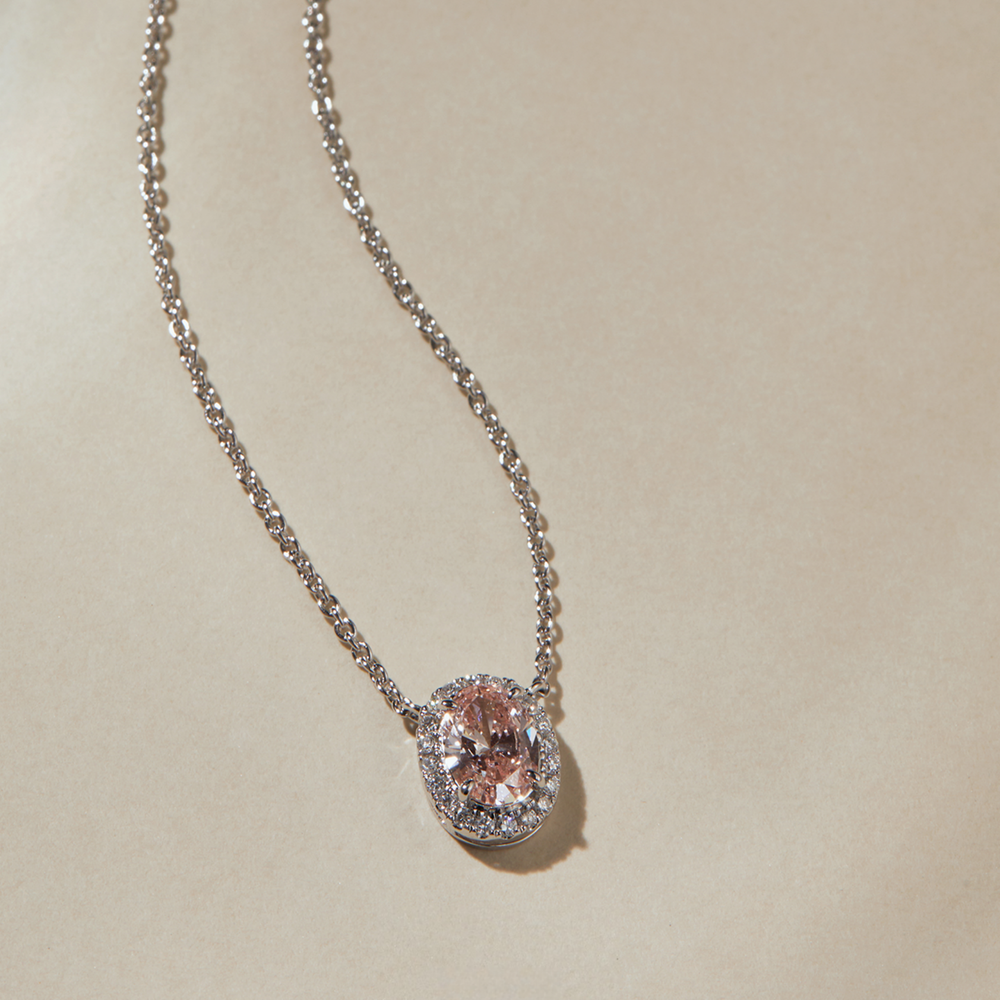 Dreamy 0.79 ct. tw. Oval-Cut Fancy Pink Lab-Grown Diamond Pendant with Petal Halo