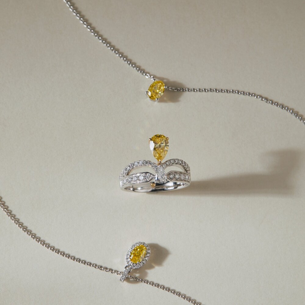 Oval Yellow Diamond Halo Necklace in 950 Platinum (0.44 ct. tw.)
