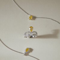 Oval Yellow Diamond Halo Necklace in 950 Platinum (0.44 ct. tw.)