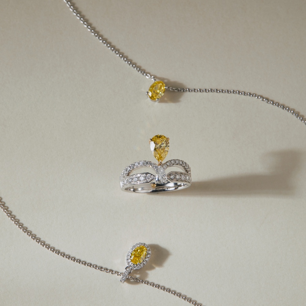 Oval Yellow Diamond Halo Necklace in 950 Platinum (0.44 ct. tw.)