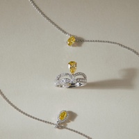 Oval Yellow Diamond Halo Necklace in 950 Platinum (0.44 ct.)