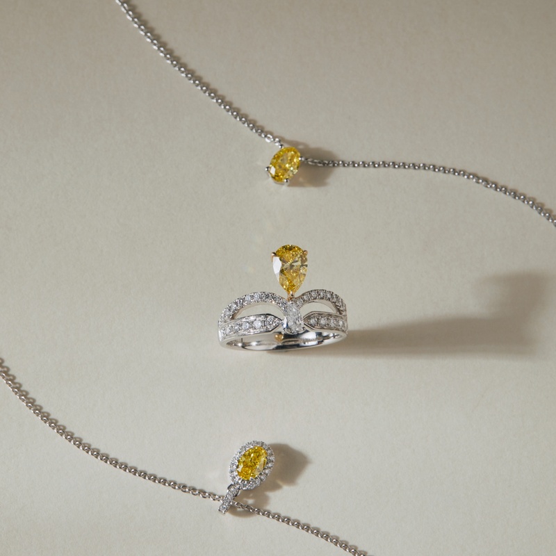 Oval Yellow Diamond Halo Necklace in 950 Platinum (0.44 ct.)